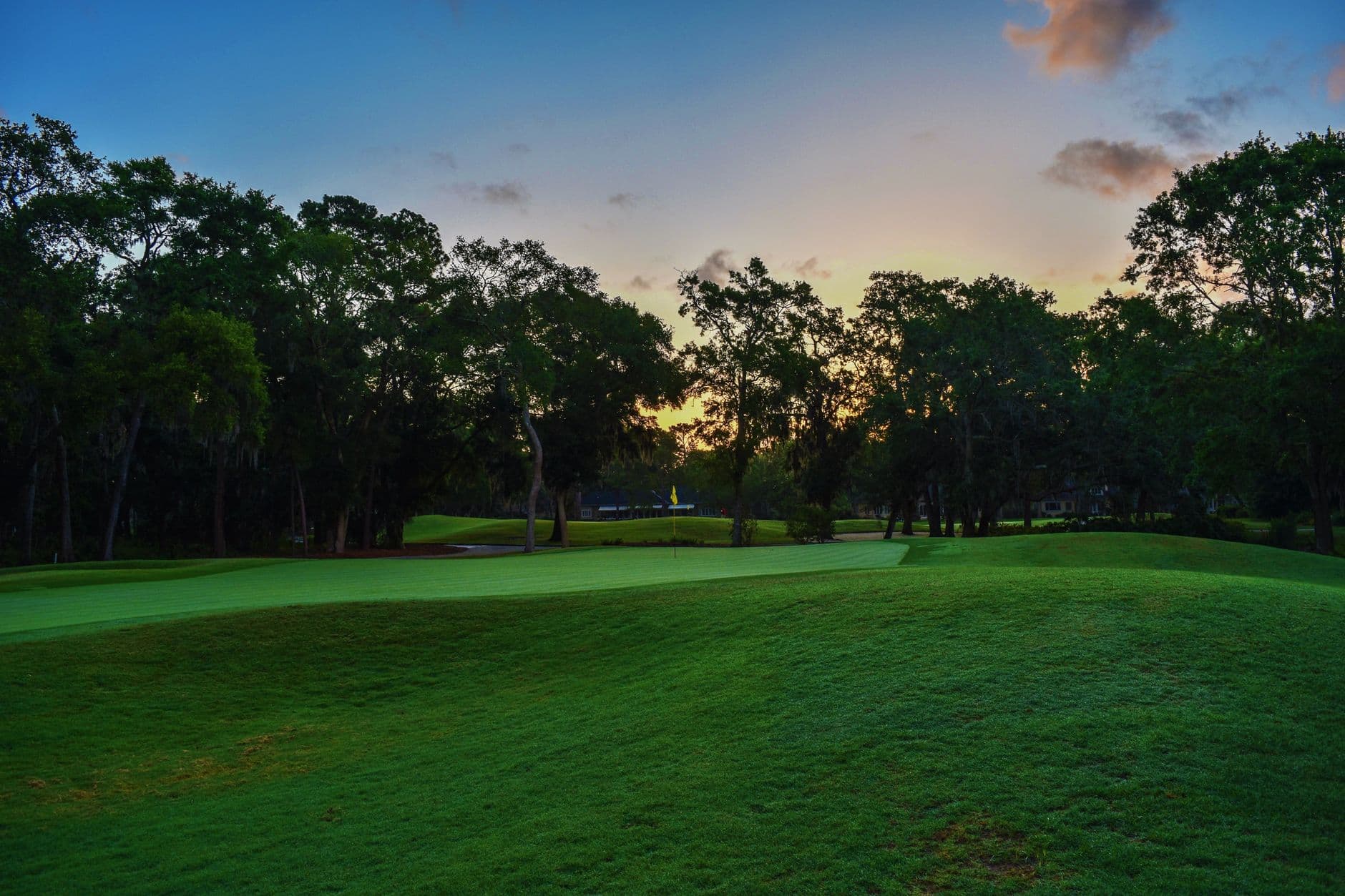 A golf green at dusk